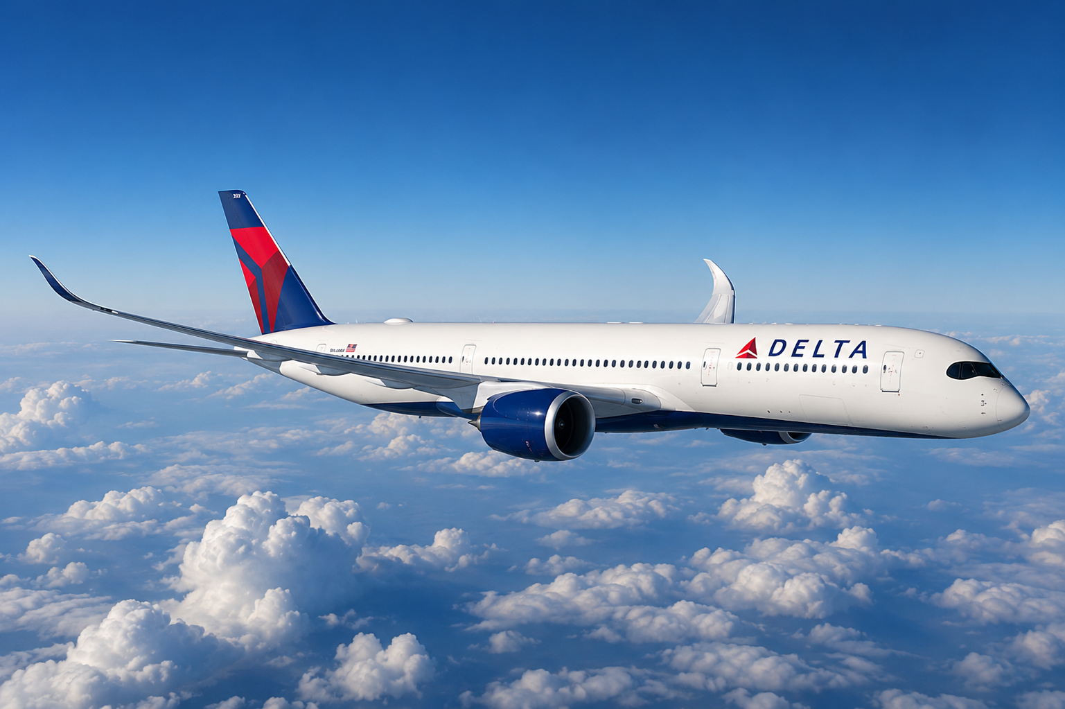 Delta airplane flying above clouds with a clear blue sky