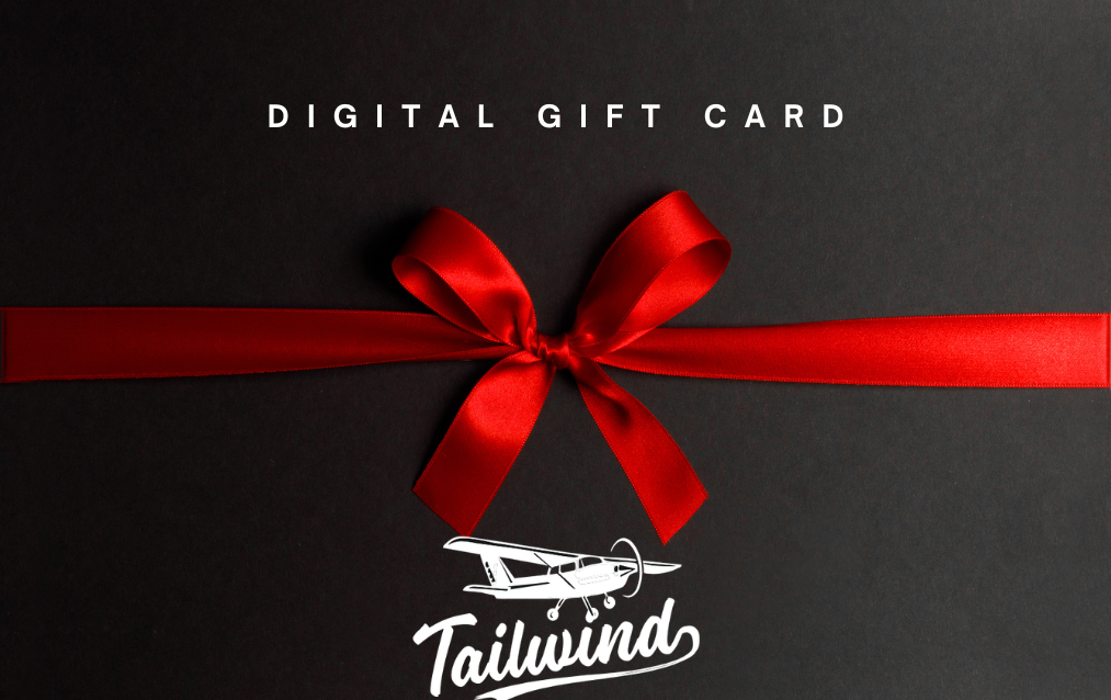 Tailwind Air digital gift card featuring a red ribbon and bow on a black gift box design, perfect for Discovery Flights, flight lessons, and aviation experiences.