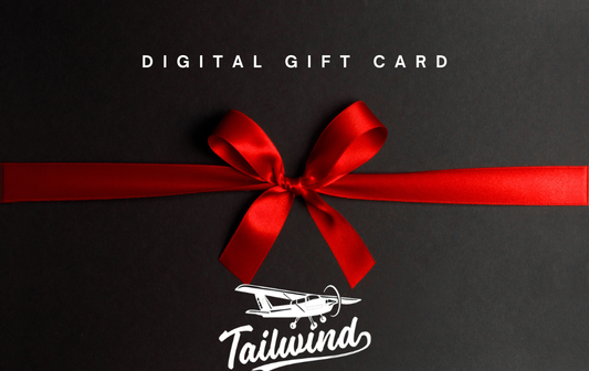 Tailwind Air digital gift card featuring a red ribbon and bow on a black gift box design, perfect for Discovery Flights, flight lessons, and aviation experiences.